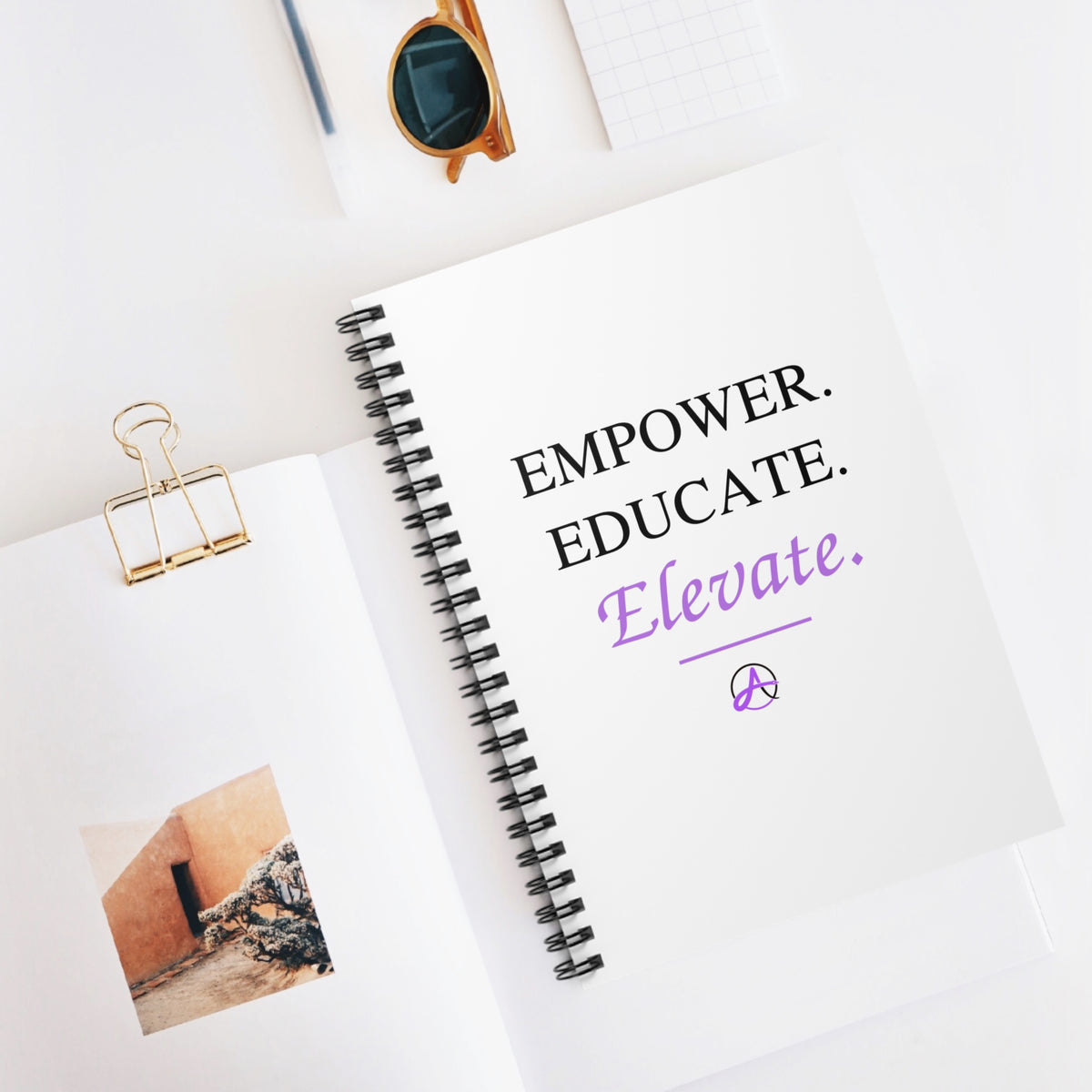 Empower. Educate. Elevate. — Spiral Notebook (Ruled)